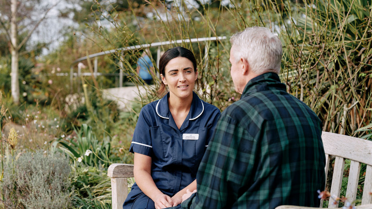 Nurse and patient in garden
