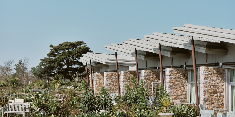 Image of the gardens at Jersey Hospice Care with view the In Patient Unit