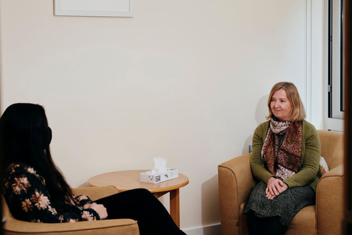 Image of counsellor and patient talking 