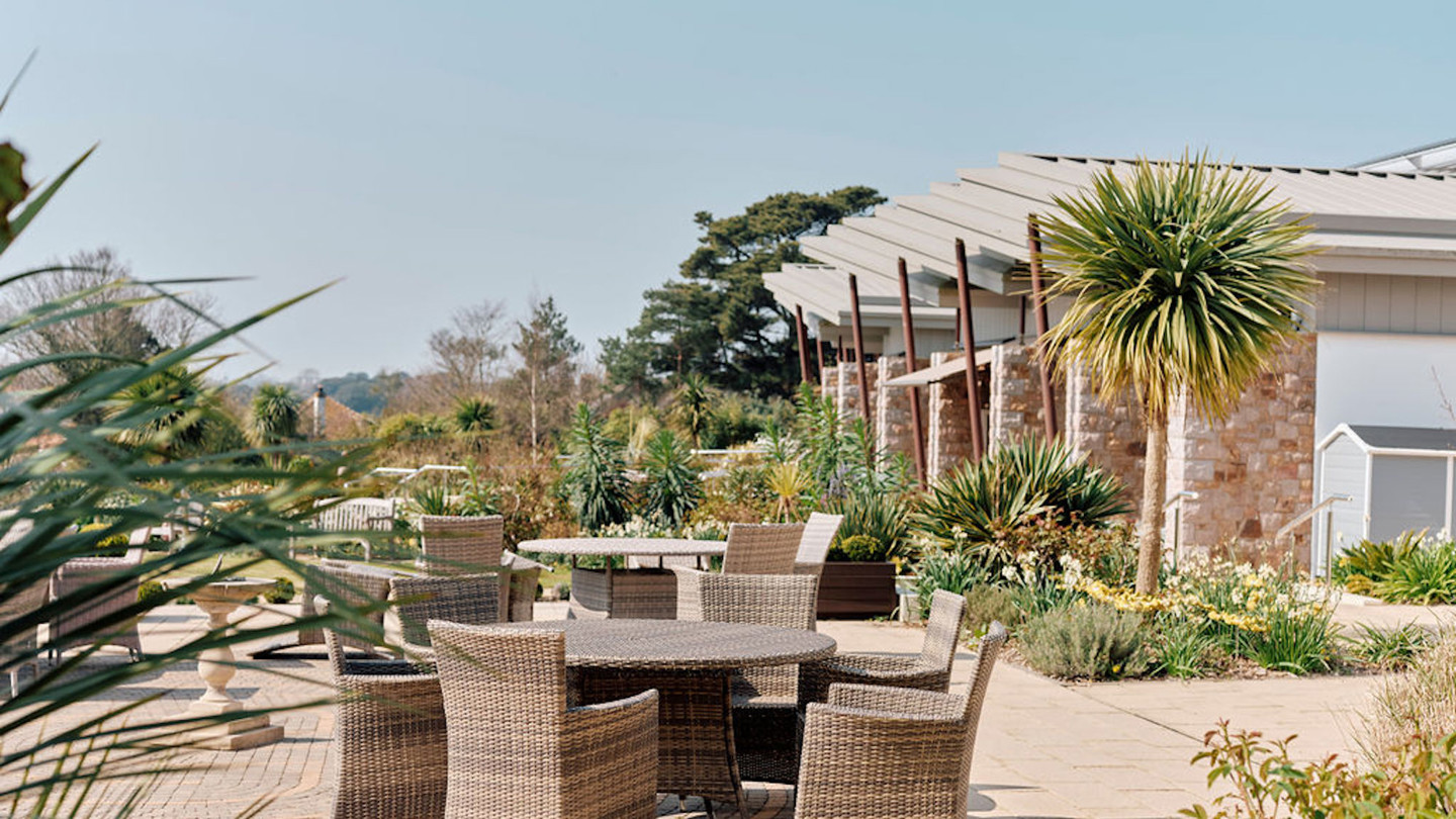 Image of table and chairs in Hospice gardens